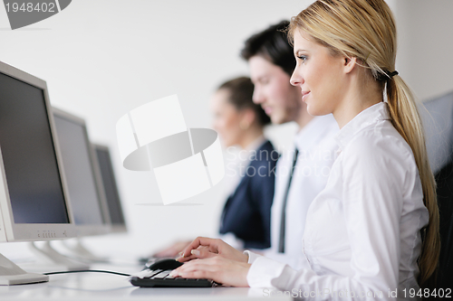 Image of business people group working in customer and helpdesk office