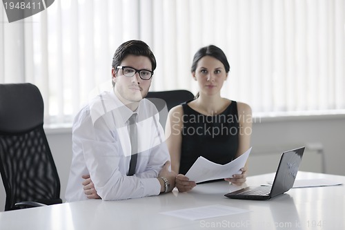Image of business people in a meeting at office