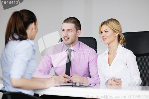 Image of Group of young business people at meeting
