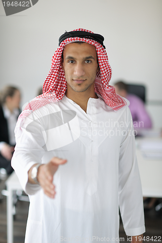 Image of Arabic business man at meeting