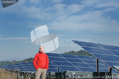 Image of Male solar panel engineer at work place