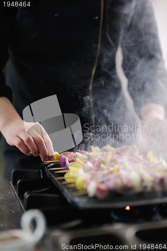 Image of chef preparing meal