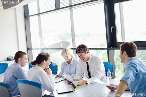 Image of business people in a meeting at office