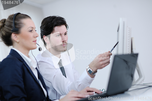 Image of business people group working in customer and helpdesk office