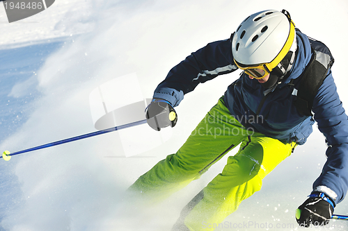 Image of skiing on fresh snow at winter season at beautiful sunny day