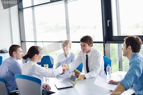 Image of business people in a meeting at office