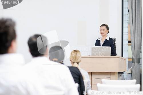 Image of business woman giving presentation