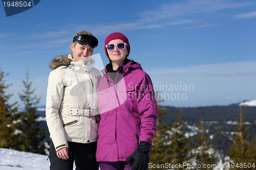 Image of winter season fun with group of girls