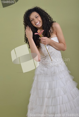 Image of Portrait of a beautiful woman dressed as a bride