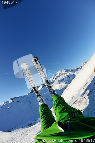 Image of skiing on fresh snow at winter season at beautiful sunny day