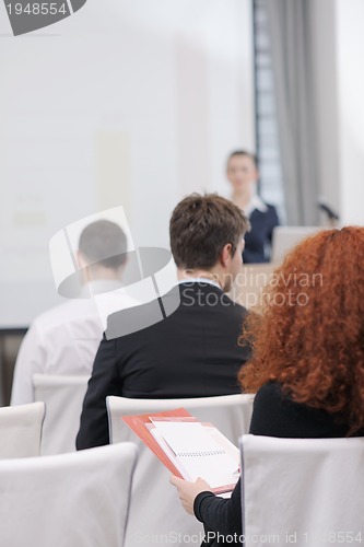 Image of business woman giving presentation