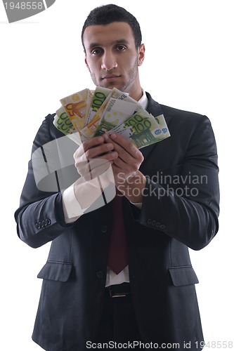 Image of Business man holding money