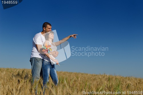 Image of happy couple in wheat field