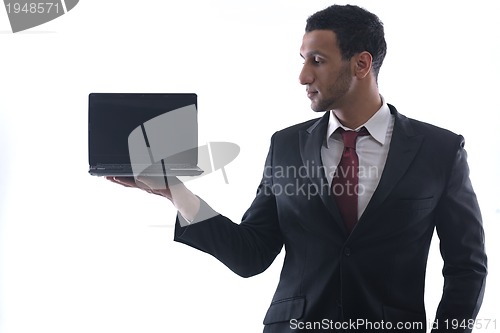 Image of business man work on mini laptop