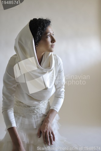 Image of Portrait of a beautiful woman dressed as a bride