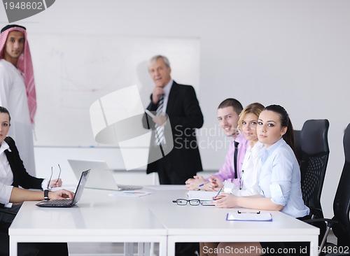 Image of Arabic business man at meeting