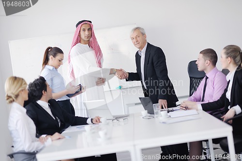 Image of Arabic business man at meeting