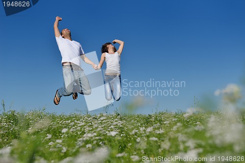 Image of happy couple in wheat field