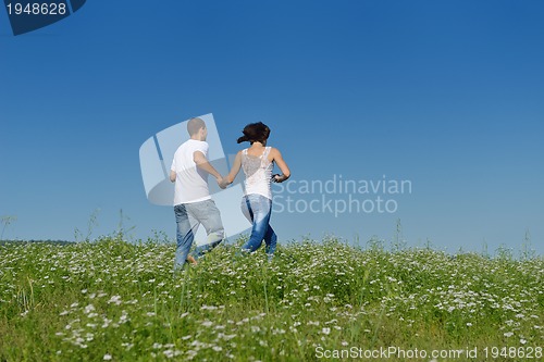 Image of happy couple in wheat field
