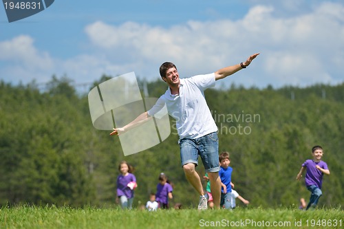 Image of happy kids group  have fun in nature
