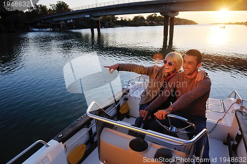 Image of couple in love  have romantic time on boat