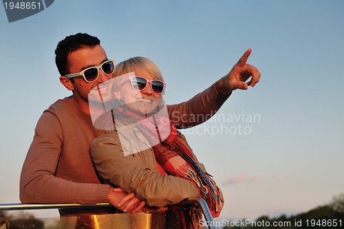 Image of couple in love  have romantic time on boat