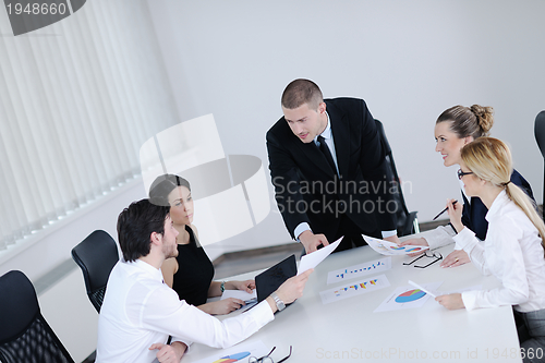 Image of business people in a meeting at office