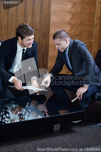 Image of business people making deal