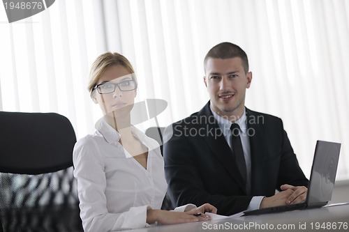 Image of business people in a meeting at office