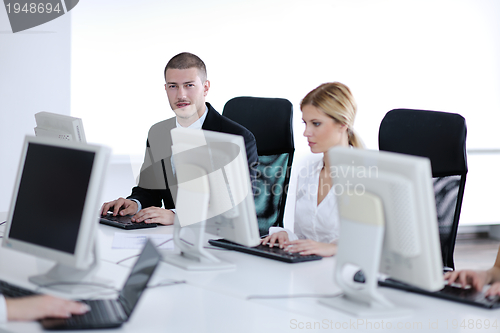 Image of business people group working in customer and help desk office