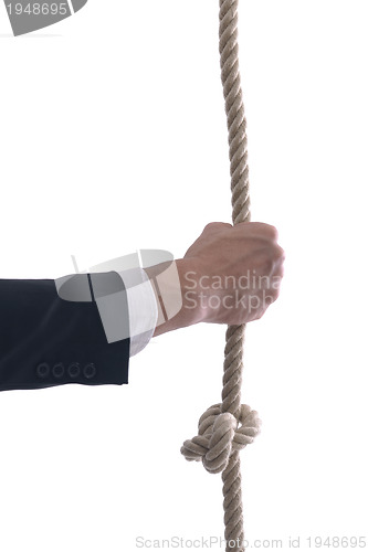 Image of business man with rope isolated on white background