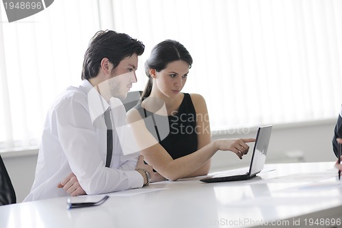 Image of business people in a meeting at office