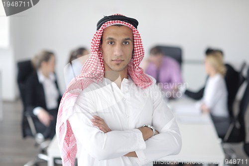 Image of Arabic business man at meeting