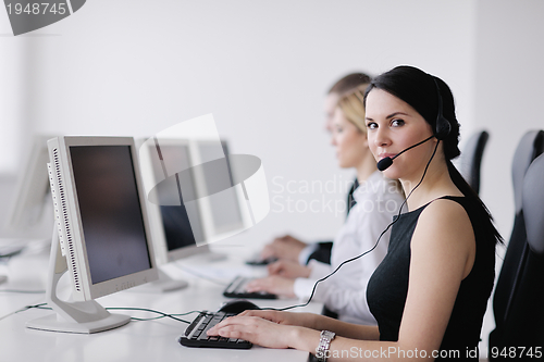 Image of business people group working in customer and help desk office