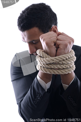 Image of business man with rope isolated on white background