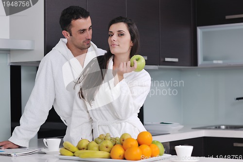 Image of young couple have fun in modern kitchen