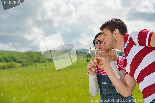 Image of romantic young couple in love together outdoor