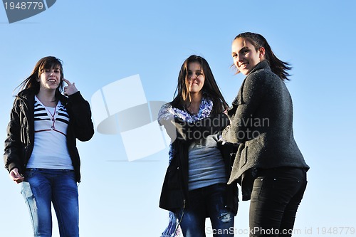 Image of group of teens have fun outdoor