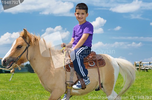 Image of child ride pony