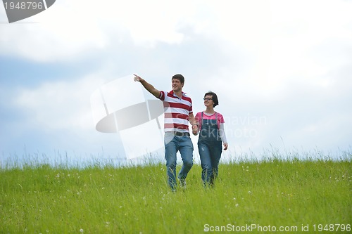 Image of romantic young couple in love together outdoor