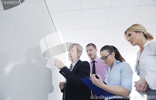 Image of Senior business man giving a presentation