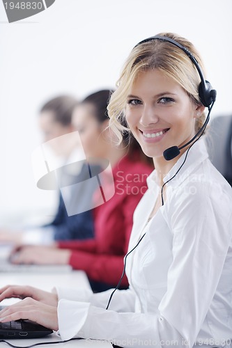 Image of business woman group with headphones