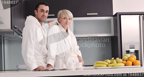 Image of young couple have fun in modern kitchen