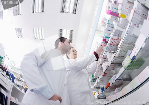 Image of pharmacy drugstore people team