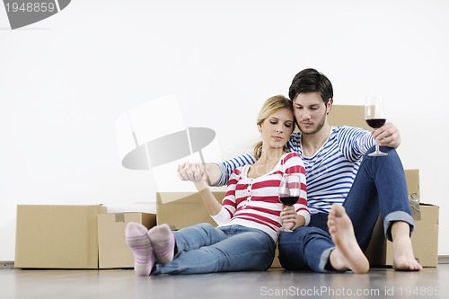 Image of Young couple moving in new home