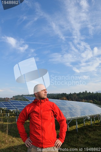 Image of Male solar panel engineer at work place