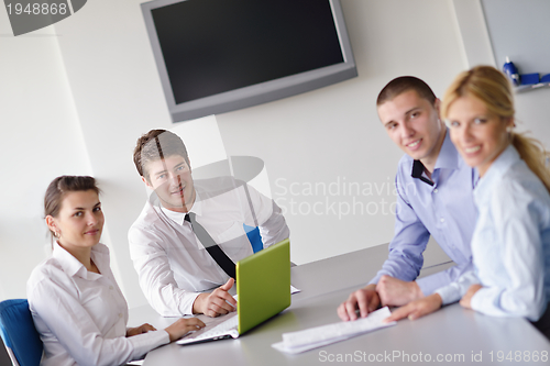 Image of business people in a meeting at office