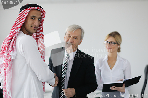 Image of Arabic business man at meeting