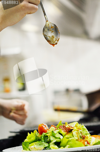 Image of chef preparing meal