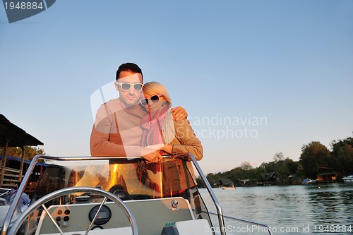 Image of couple in love  have romantic time on boat